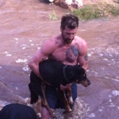 Man Strips Down And Jumps Into Raging River To Save Drowning Dog