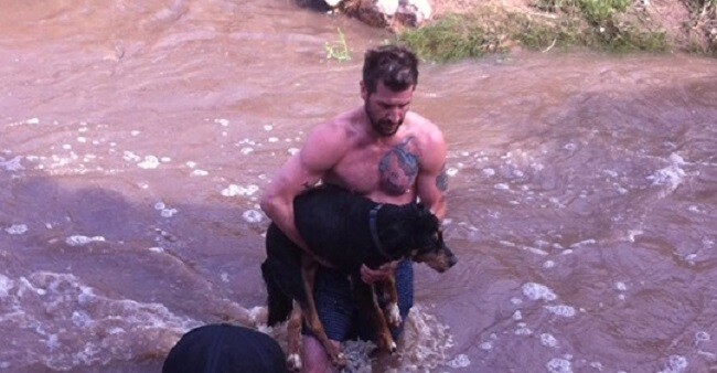 Man Strips Down And Jumps Into Raging River To Save Drowning Dog